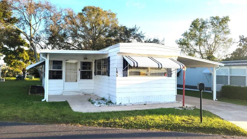 Dundee, FL Mobile Home for Sale located at 165 Juniper Drive West Dell Lake Village